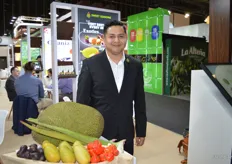 Jonas Alvarez with Sweet Seasons has different exotic produce varieties on display, including jackfruit.